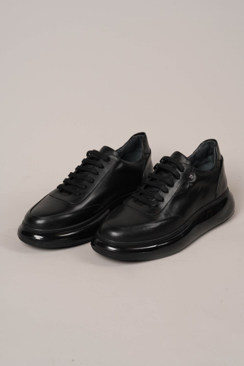full black glossy sole sneakers
